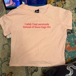 Pink Graphic Tee with Bold Red Slogan